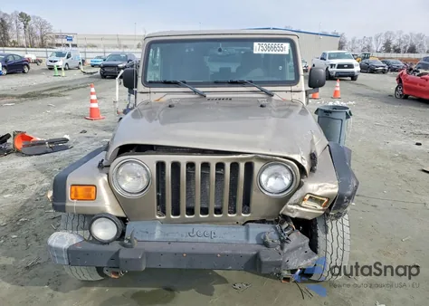 2003 Jeep Wrangler / Tj Sahara z USA, uszkodzony, nr VIN 1J4FA59S43P304642